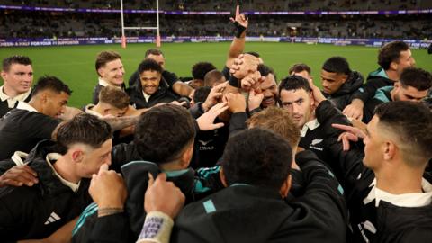 All Blacks players celebrate
