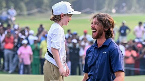 Tommy Fleetwood and his son Frankie in Delhi