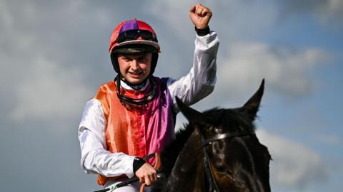 Sean Bowen celebrates onboard Haiti Couleurs after winning the BoyleSports Irish Grand National Chase on day three of the Fairyhouse Easter Festival at Fairyhouse Racecourse in Ratoath, Meath, in April 2025