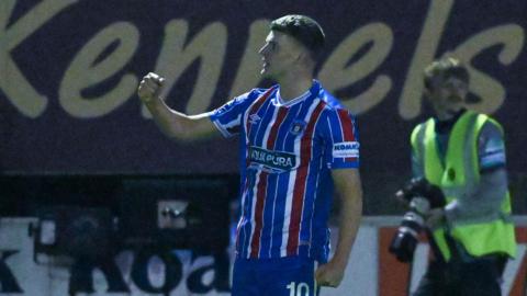 Regan Linney celebrates a goal for Carlisle United