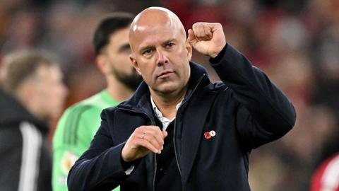 Arne Slot fist-pumps