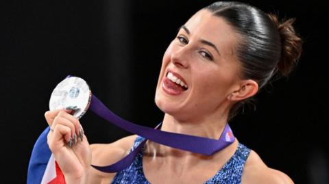 Amy Hunt celebrates winning world 200m silver