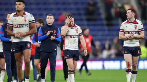 England players look dejected at the final whistle