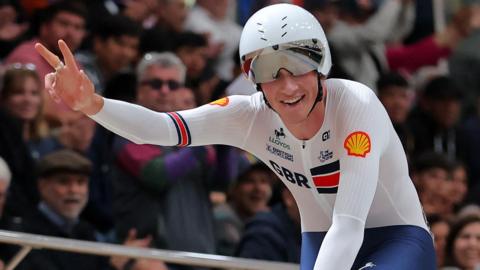 GB's Josh Tarling celebrates winning the world points race title