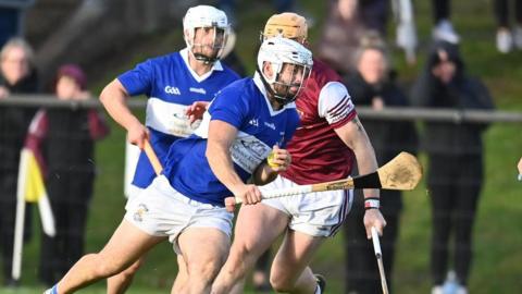 Ciaran Johnston bursts out of defence during St John's semi-final win against Cushendall