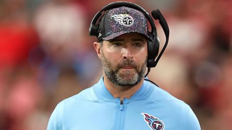 Brian Callahan with a pensive look on his face while coaching the Tennessee Titans