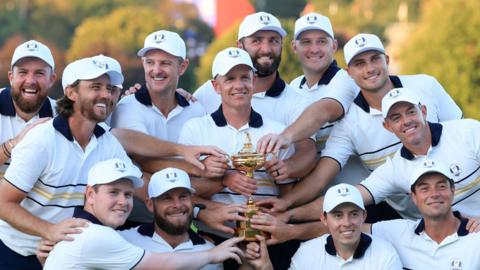 Luke Donald is surrounded by his European players
