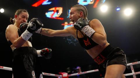 Mikaela Mayer lands a jab against Mary Spencer