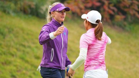 Charley Hull hugs Ayaka Furue