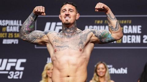 Tom Aspinall weighs in and grins