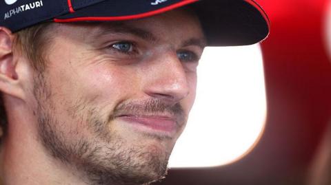 Max Verstappen smiling after securing pole at the Italian Grand Prix