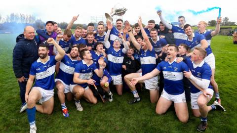 St John's players celebrate their one-point win over Loughgiel