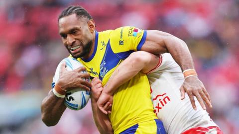 Rodrick Tai in action for Warrington Wolves against Hull KR