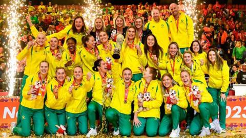Australia players celebrate with the Netball World Cup