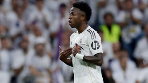 Real Madrid winger Vinicius Junior reacts angrily to being substituted during El Clasico