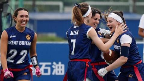 Great Britain players celebrate during their win over China at the 2025 World Games