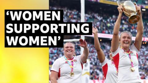England captain Zoe Aldrcoft raises the World Cup trophy and celebrates with team mate Sarah Bern