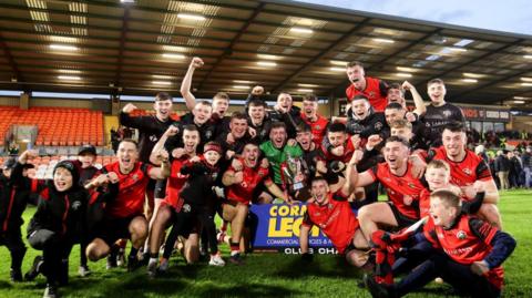 Madden's players and supporters celebrate