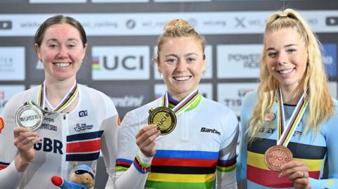 Katie Archibald, Lara Gillespie and Helene Hesters with their medals from the women's elimination race at the 2025 Track World Championships