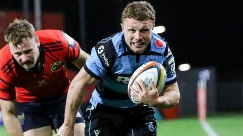 Cardiff's Tom Bowen heads for the line against Munster
