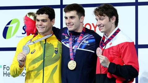 Silver medallist Gabriel Bandeira of Team Brazil, gold medallist William Ellard of Team Great Britain and bronze medallist Nicholas Bennett of Team Canada