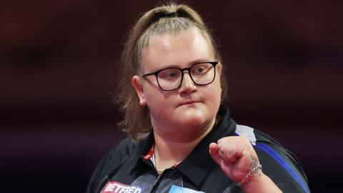 Beau Greaves clenches her fist in celebration