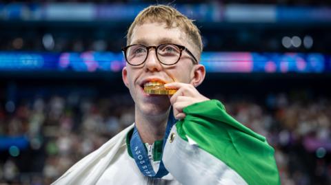 Daniel Wiffen celebrates his Olympic gold medal at the 2024 Olympics in Paris