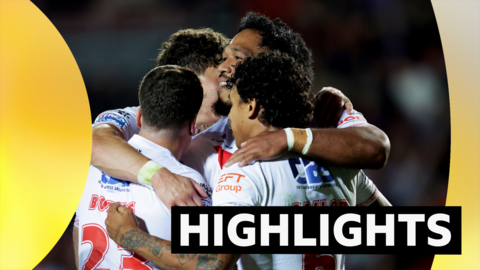 Tristan Sailor of St Helens celebrates with team mates after scoring their seventh try